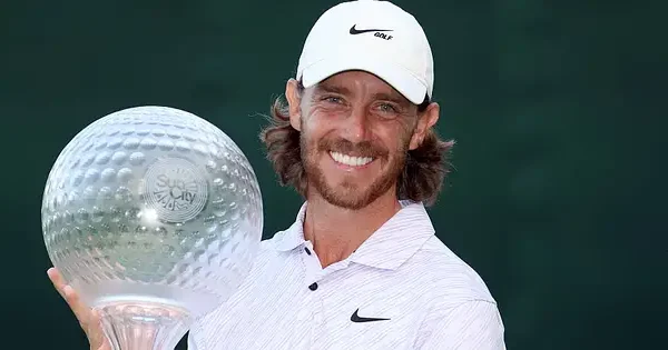 tommy-fleetwood-with-sun-city-trophy