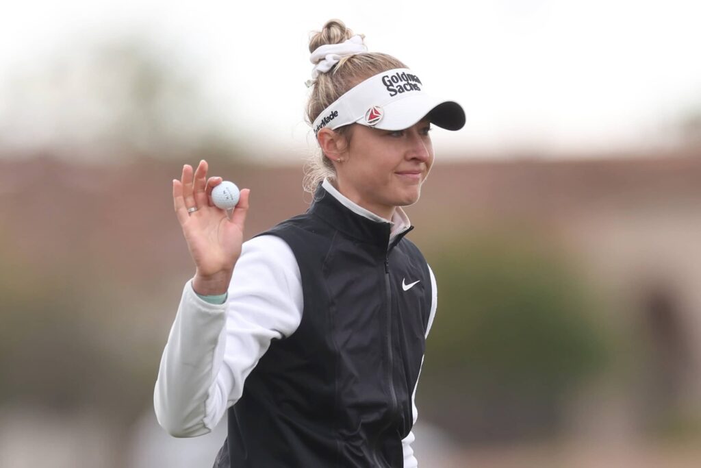 Nelly Korda holds her TaylorMade Golf ball