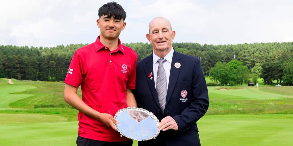 England Golf President Ian Watkins presents Daniel Hayes (left) with the George Henriques Salver