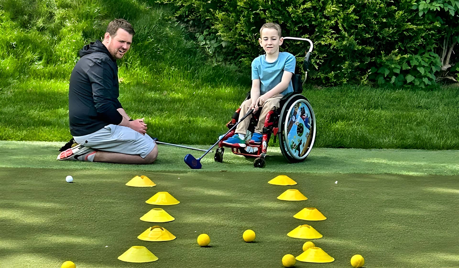 Young person putts from wheelchair
