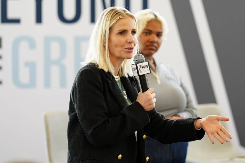 Fore All CEO and Founder Jen Clyde speaks during the PGA WORKS Beyond the Green
