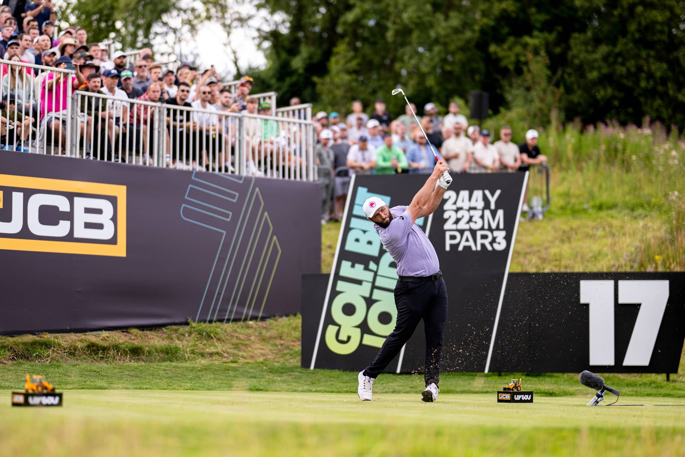 Captain Jon Rahm of Legion XIII hits his shot from the 17th tee during the first round of LIV Golf United Kingdom by JCB