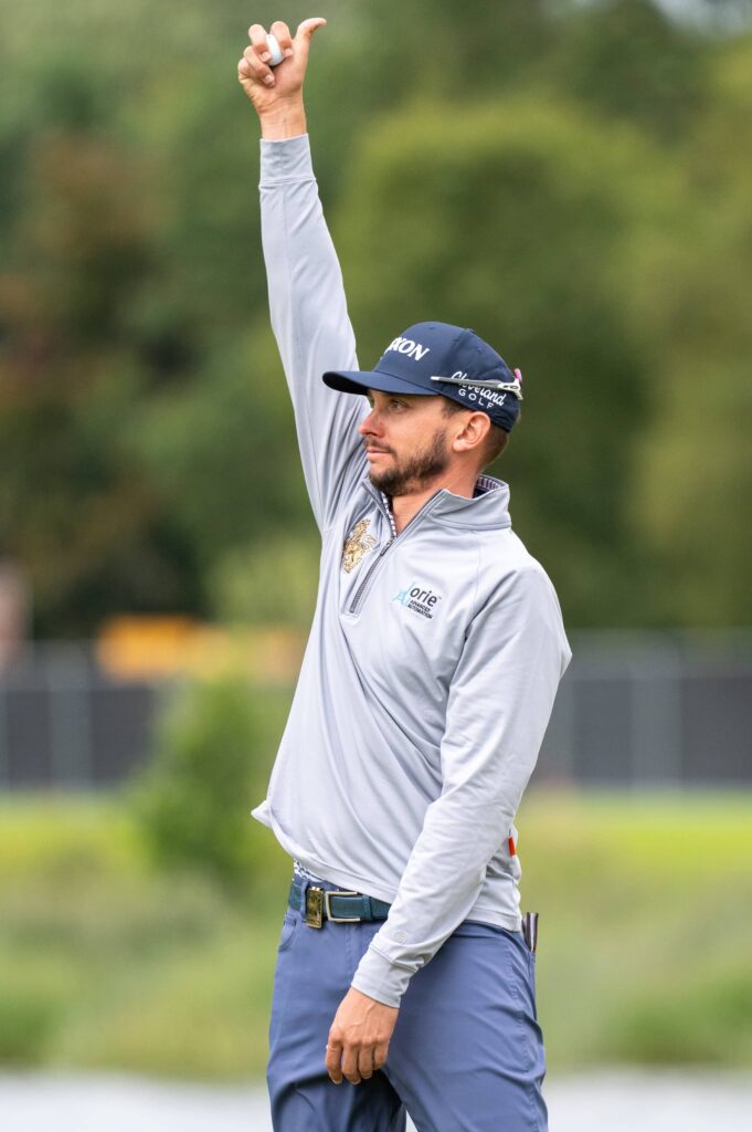 Crushers GC alternate, John Catlin, reacts after making a hole-in-one on the 17th hole during the second round of LIV Golf at JCB Golf & Country Club