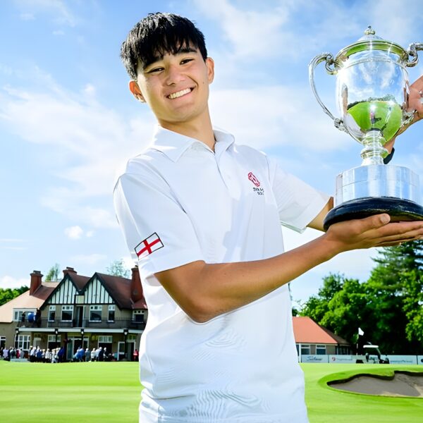 Daniel Hayes holds Harris Trophy