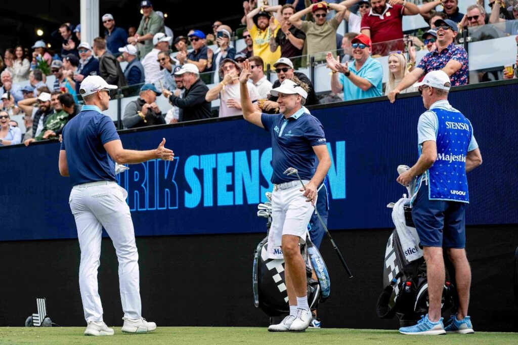 Ian Poulter high fives Majesticks teammate