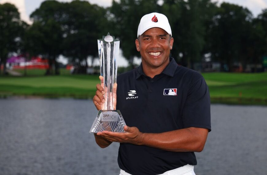 Jhonattan Vegas of Venezuela poses with the winner’s trophy after the final round of the 3M Open at TPC Twin Cities