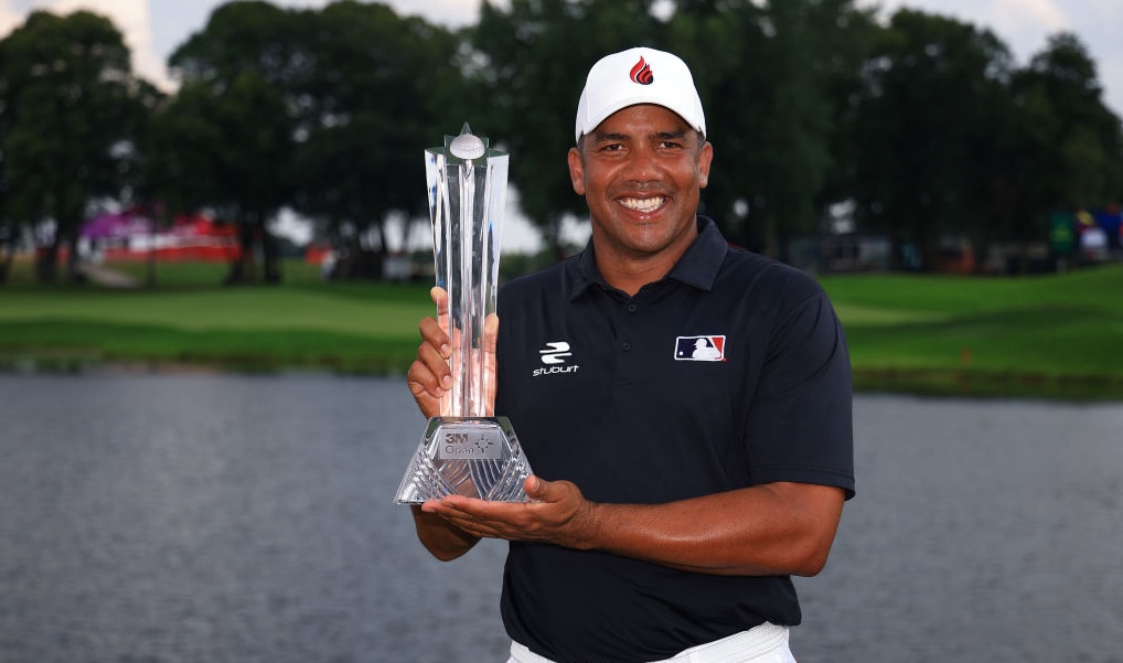 Jhonattan Vegas of Venezuela poses with the winner’s trophy after the final round of the 3M Open at TPC Twin Cities