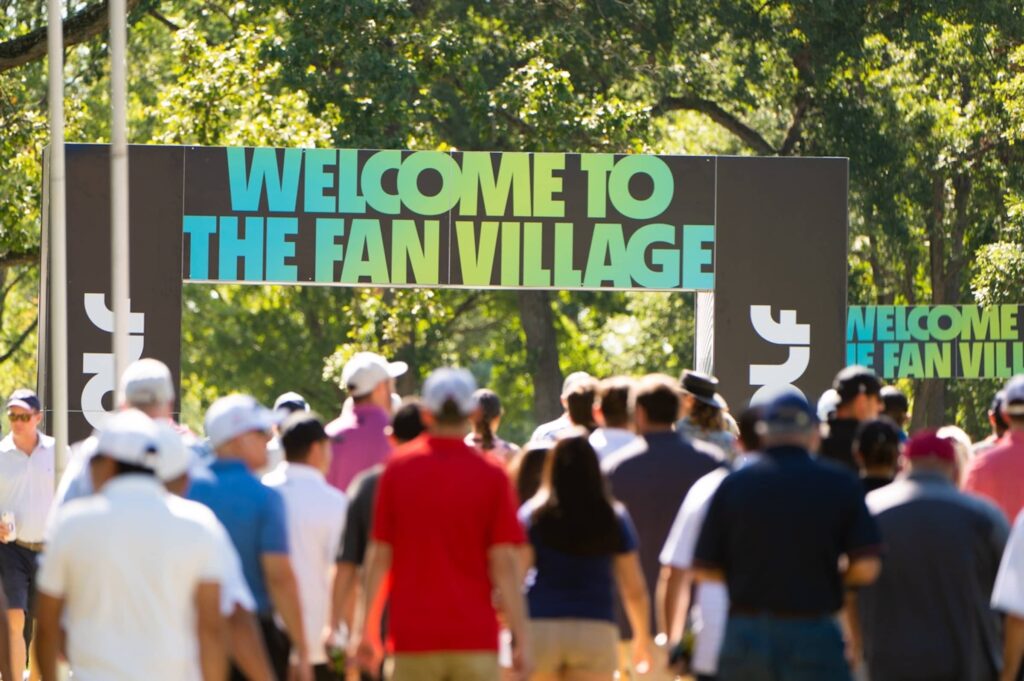 LIV Golf Fans walk to fan village