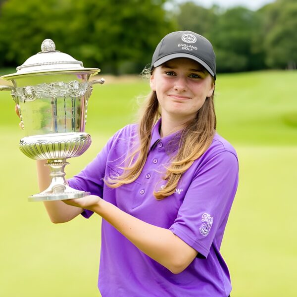 Lauren Crump holds the English Girls' Open Amateur Stroke Play Championship trophy