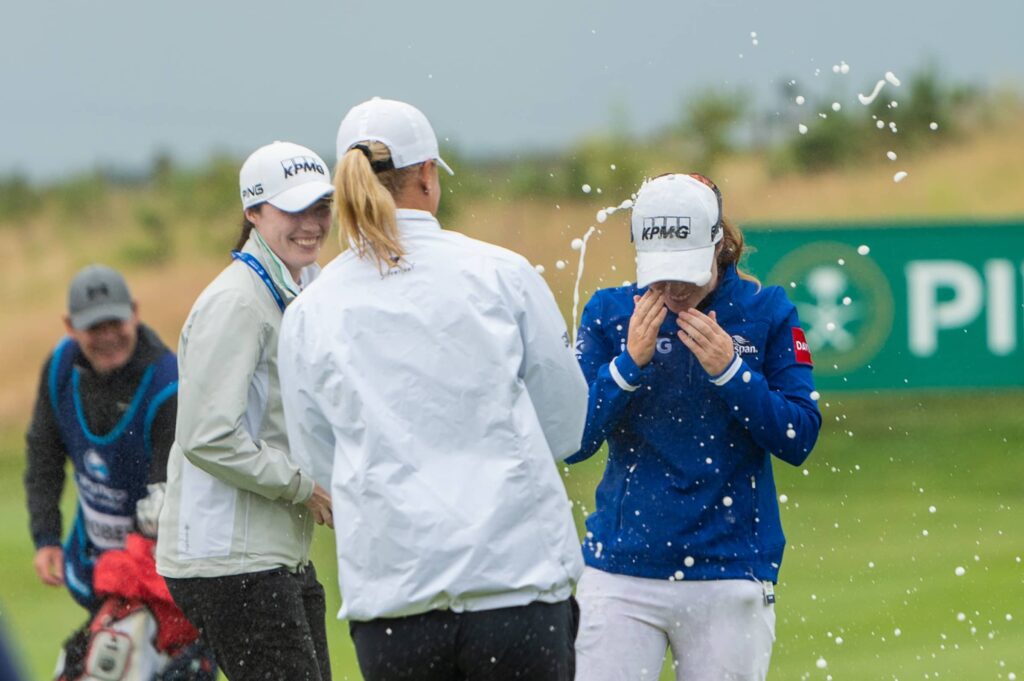 Leona Maguire celebrates on the 18th hole after her eagle putt