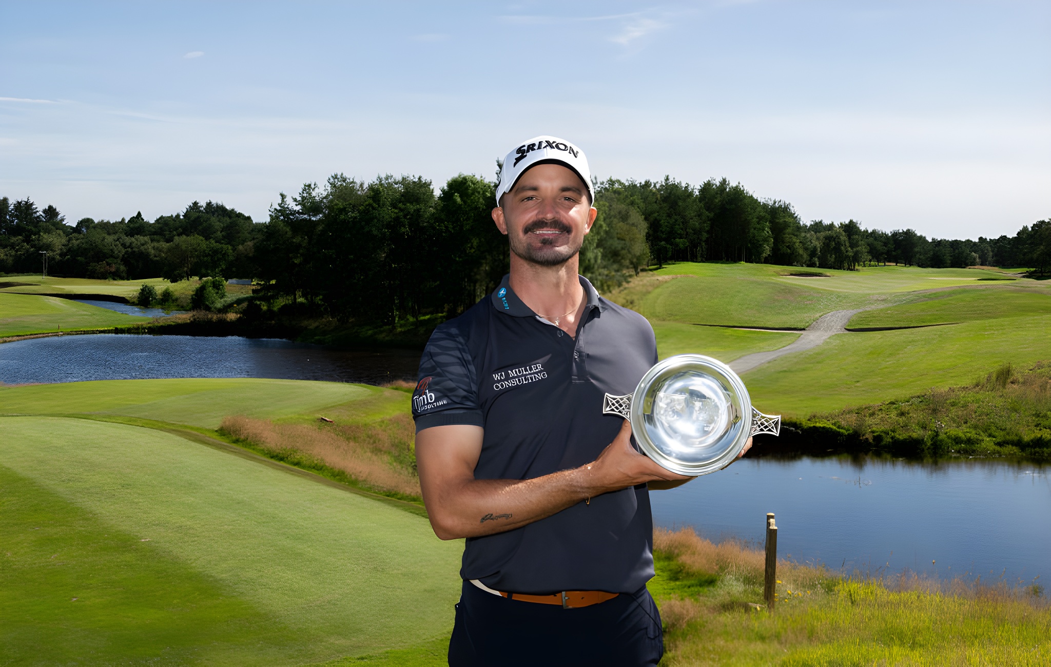 Brandon Robinson Thompson of England with the trophy after winning the Farmfoods Scottish Challenge supported by the R&A 2024 at Newmachar Golf Club