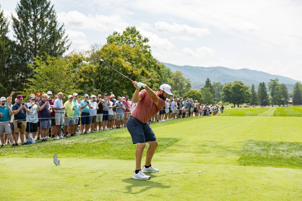 Captain Jon Rahm of Legion XIII hits his shot from the 12th tee