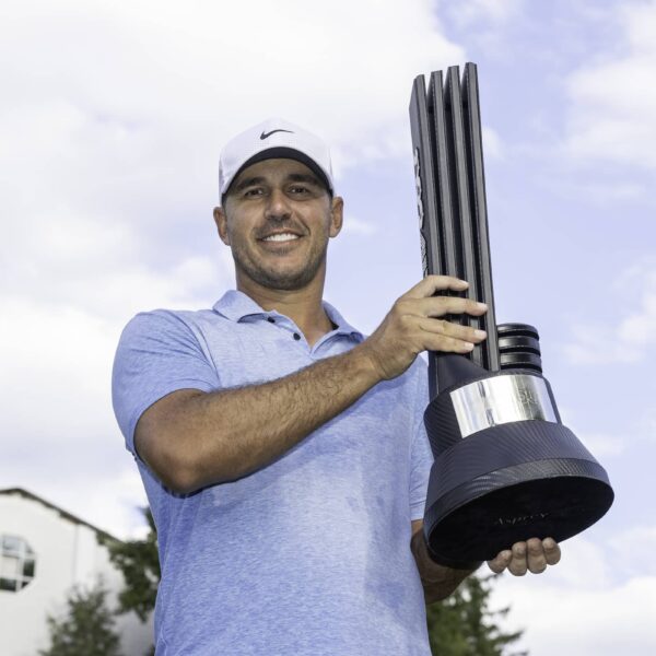 Individual Champion Captain Brooks Koepka of Smash GC poses with the trophy after the final round of LIV Golf Greenbrier