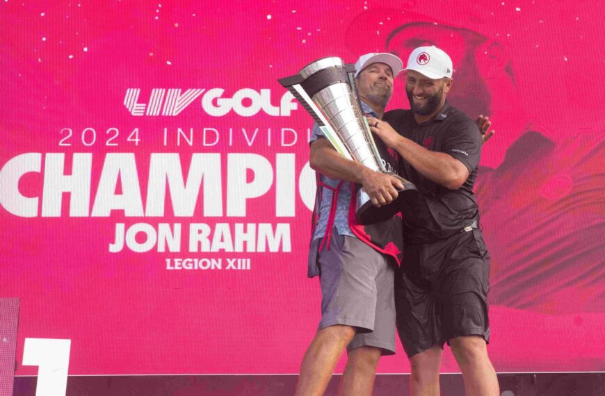 2024 Individual Champion Jon Rahm celebrates with caddie Adam Hayes at Bolingbrook Golf Club