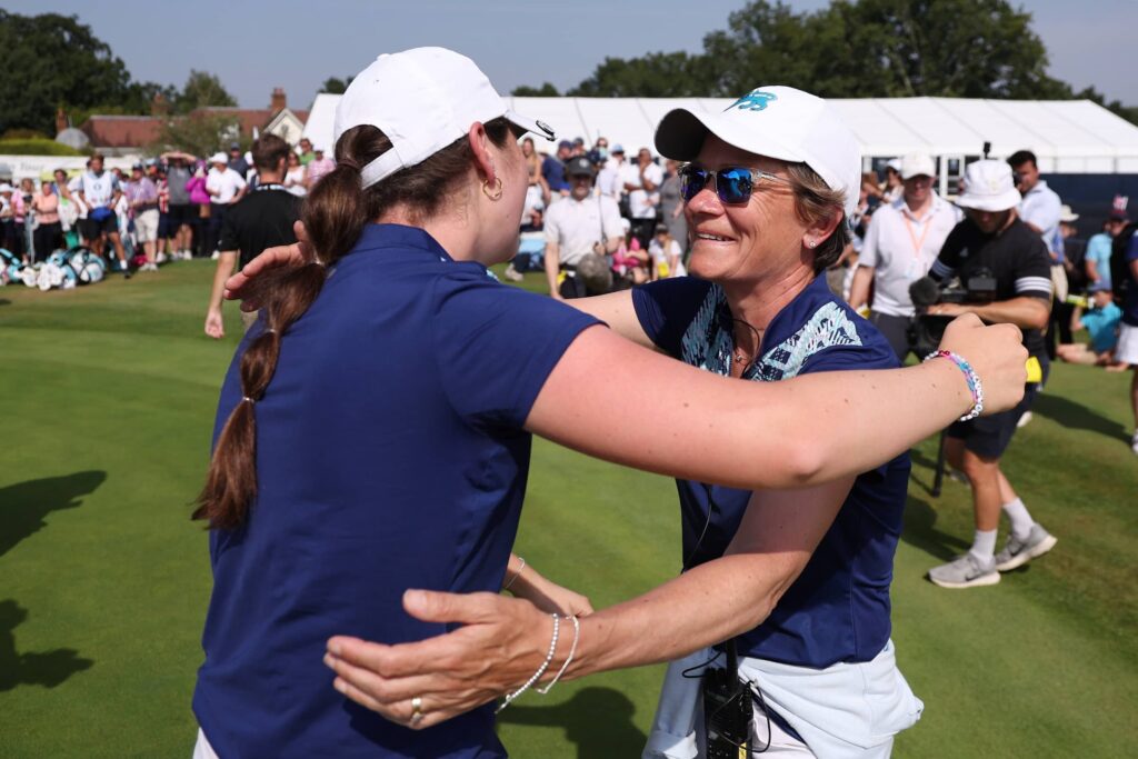 Great Britain and Ireland Captain Catriona Matthew celebrates with Aine Donegan on the 18th at the 43rd Curtis Cup at Sunningdale