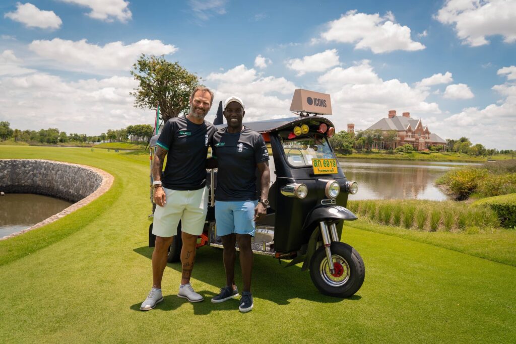 Patrik Berger and Dwight Yorke