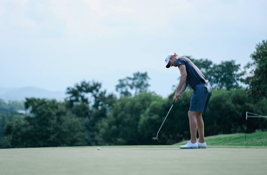 Chris Wood hits a putt during a pre-tournament practice round at the Black Mountain Championship in Hua Hin, Thailand