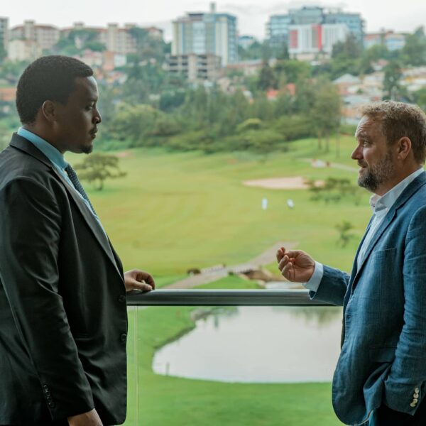 Josue Dushimimana (pictured left), CEO of Rwanda Ultimate Golf Course, and Ed Edwards, 54 CEO, on the clubhouse balcony at Kigali Golf Resort and Villas.