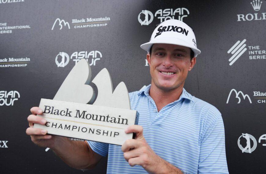 Michael Maguire pictured with the Black Mountain Championship trophy