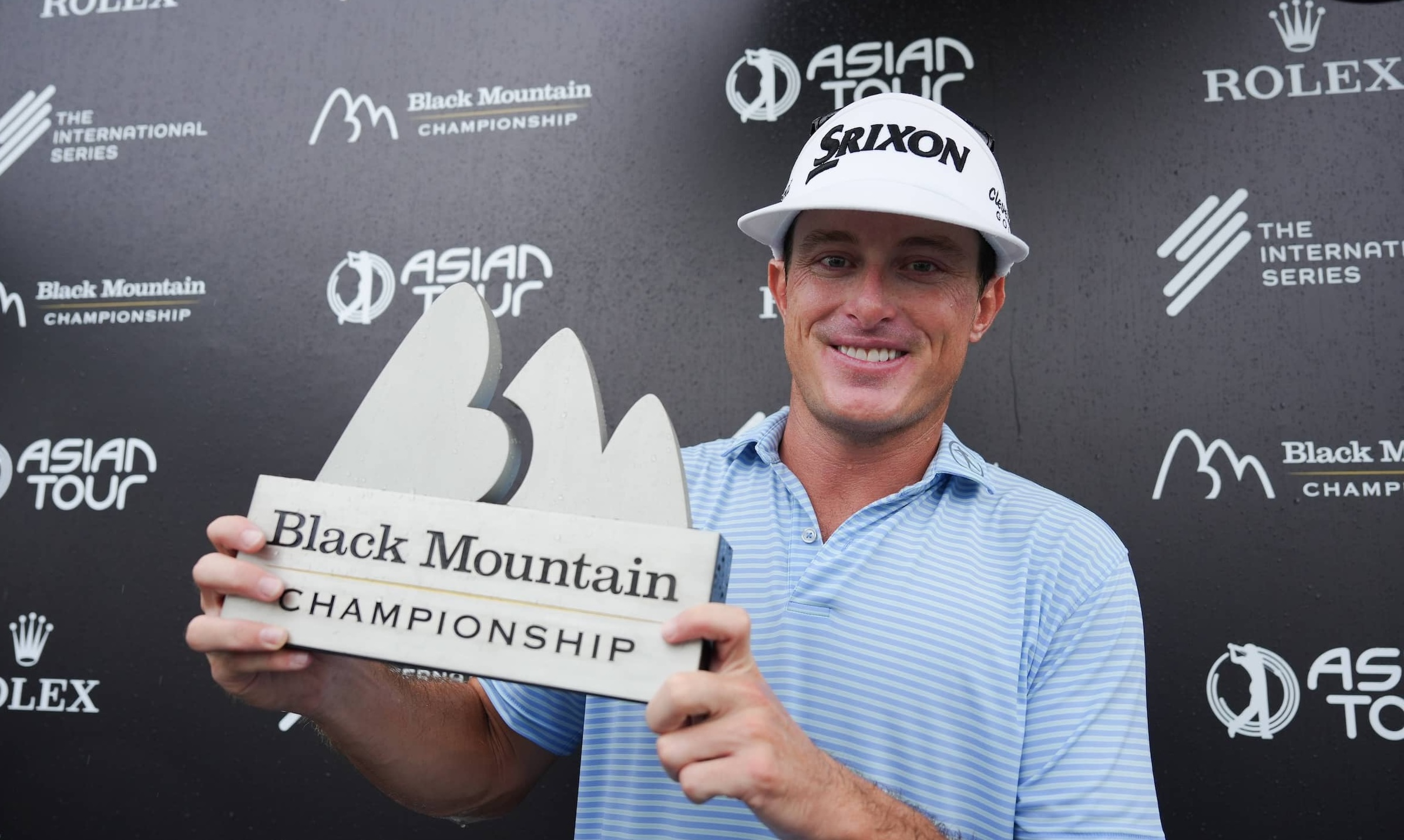 Michael Maguire pictured with the Black Mountain Championship trophy