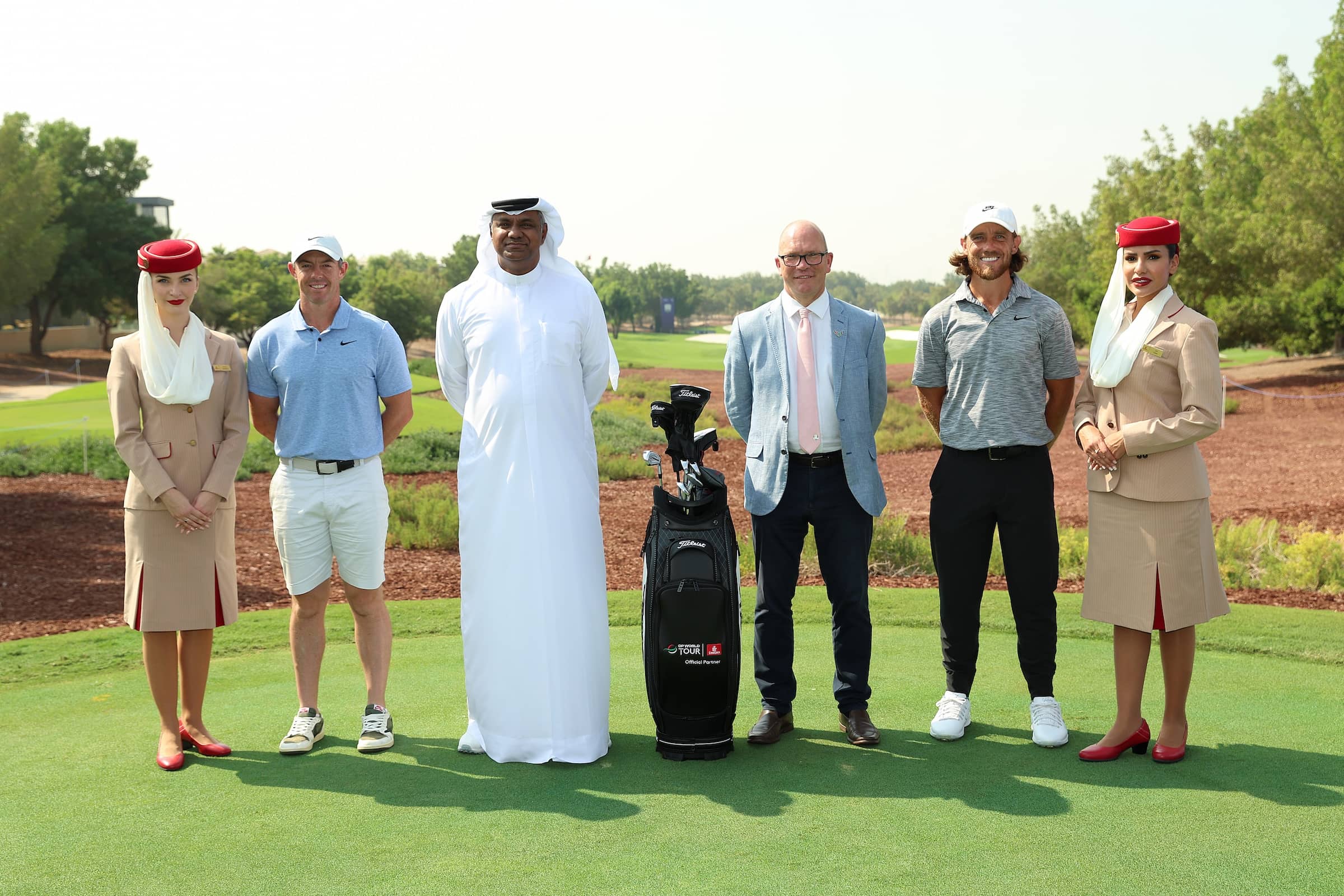 Emirates cabin crew with Rory McIlroy, Nabil Sultan (Divisional Senior Vice President, Emirates), Guy Kinnings (CEO, DP World Tour) and Tommy Fleetwood