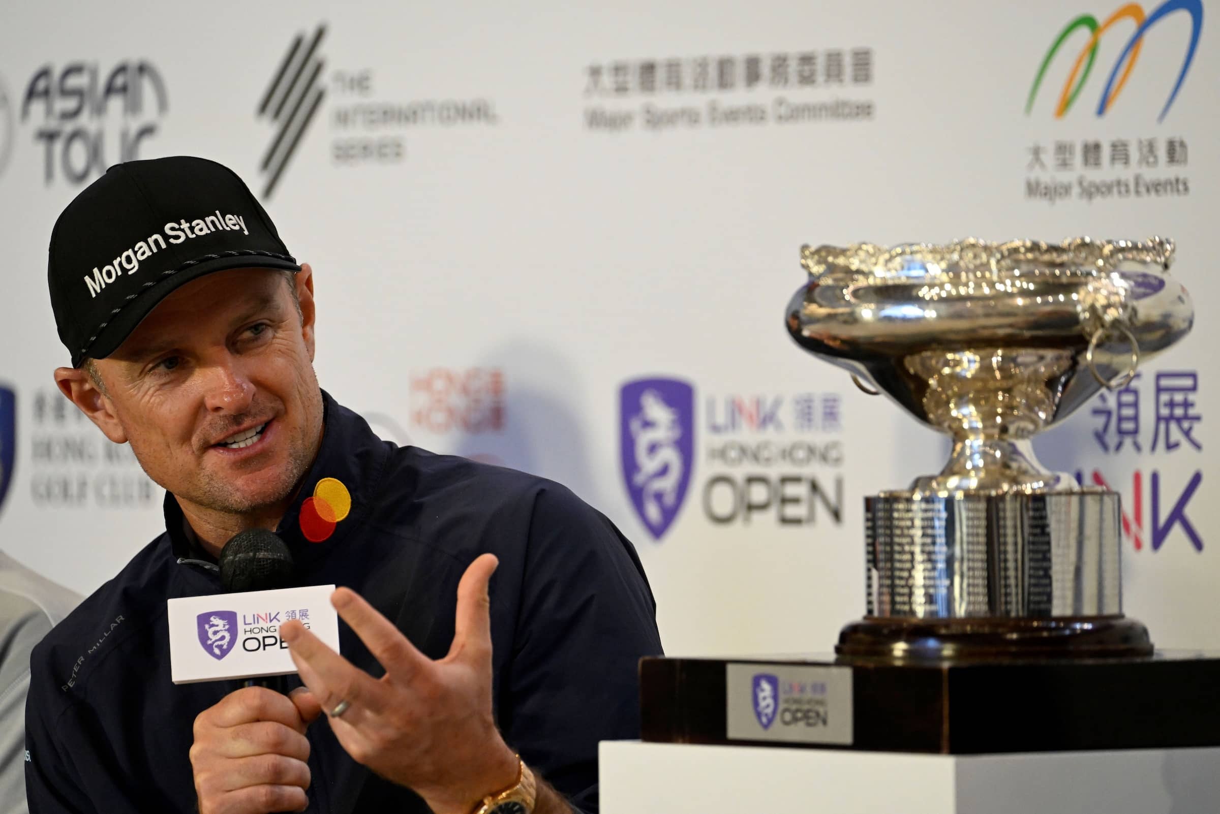 Justin Rose, seated next to the Hong Kong Open trophy, answers a question during the pre-tournament press conference for the Link Hong Kong Open taking place from 21-24 November.