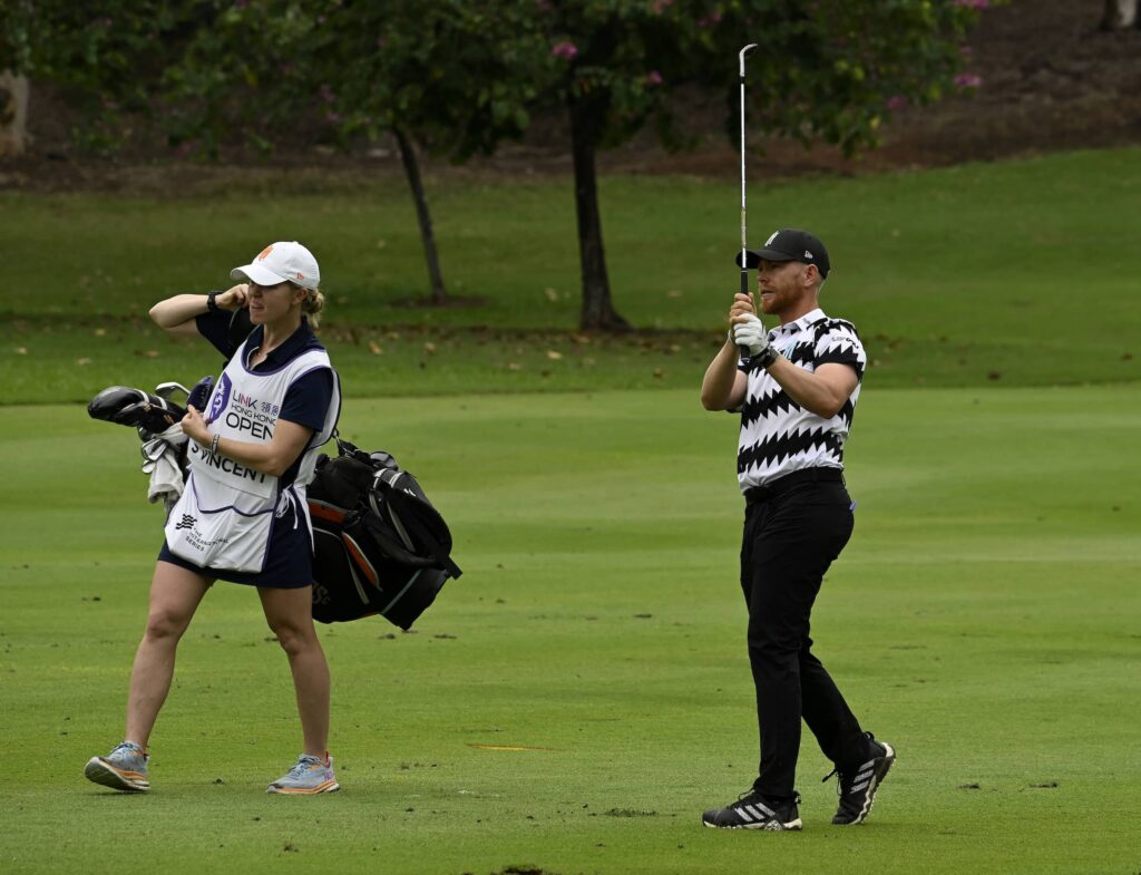 Scott Vincent pictured with his wife and caddie Kelsey at the Hong Kong Golf Club