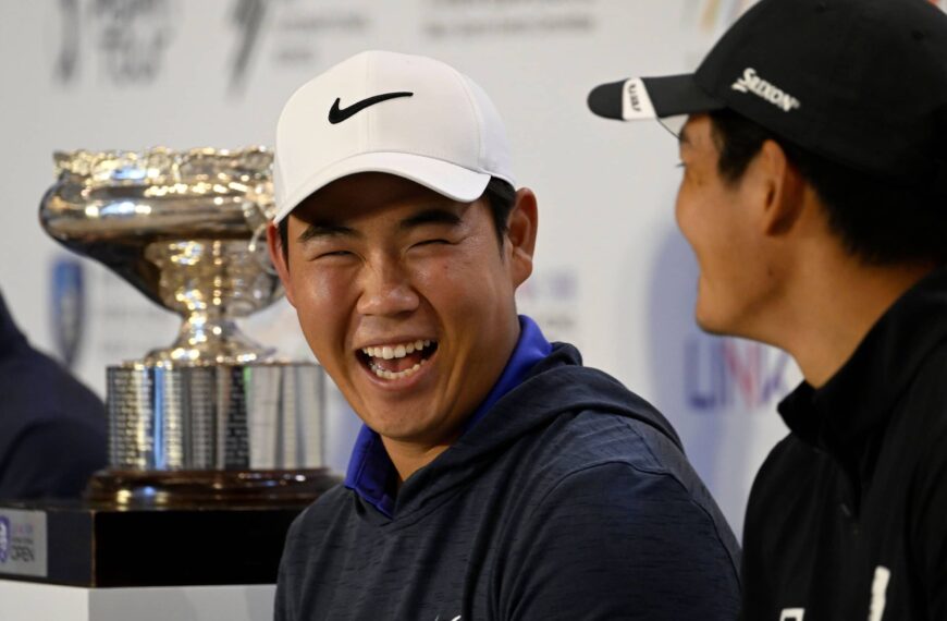 Tom Kim shares a laugh with Taichi Kho during the pre-tournament press conference ahead of the Link Hong Kong Open, the eighth event on The International Series