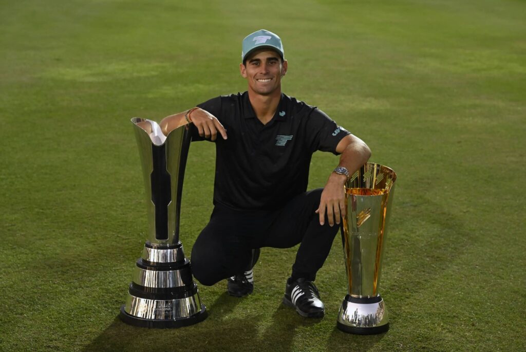 Joaquin Niemann pictured with the trophies for the PIF Saudi International