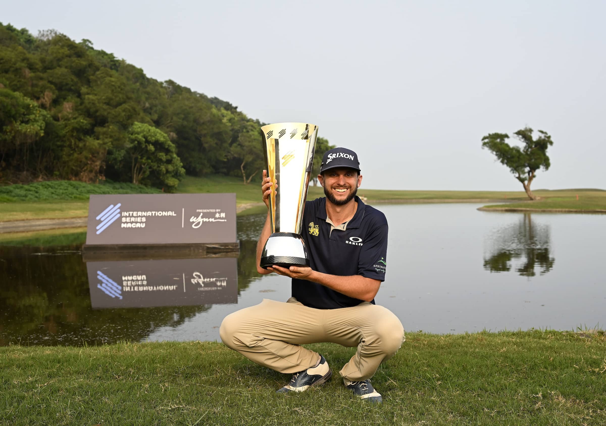 John Catlin pictured with the winner’s trophy at Macau Golf and Country Club following International Series Macau presented by Wynn, the second of 10 events on The International Series in 2024.