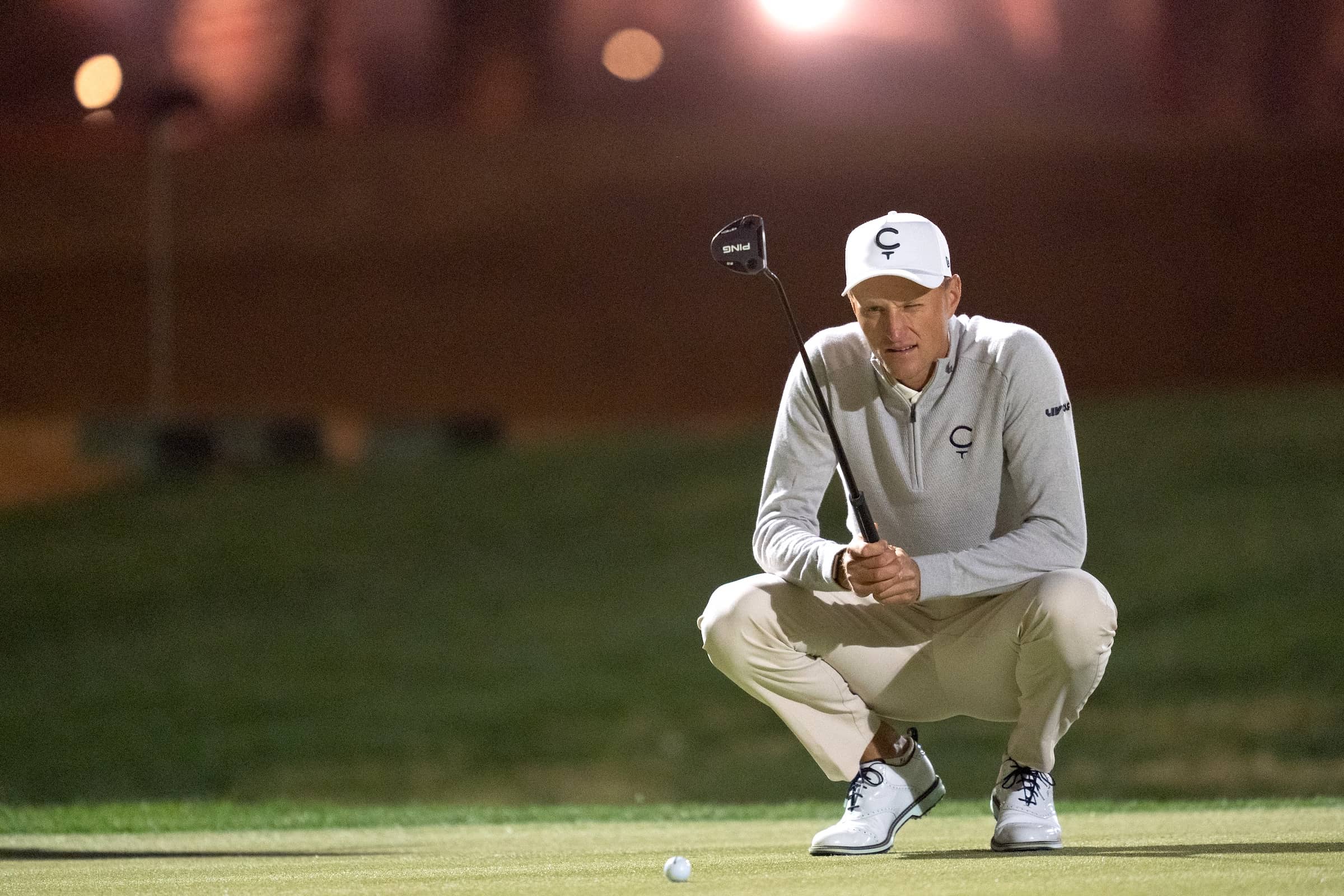 Adrian Meronk of Cleeks GC lines his putt on the first green during the second round of LIV Golf Riyadh at Riyadh Golf Club