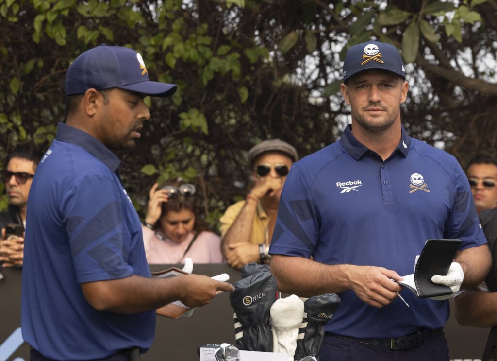 Bryson DeChambeau of the US pictured with Crushers GC team-mate Anirban Lahiri of India on the final round at International Series India presented by DLF. © Asian Tour.