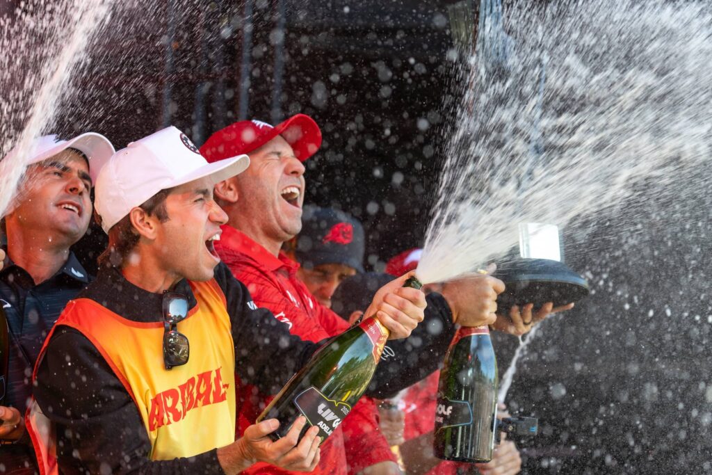 First place team champions, Captain Sergio Garcia of Fireballs GC, Luis Masaveu of Fireballs GC, Abraham Ancer of Fireballs GC and caddies Ramon and Alberto Sanchez, spray champagne during the trophy ceremony after the final round of LIV Golf Adelaide at Grange Golf Club © Ferrey/LIV Golf