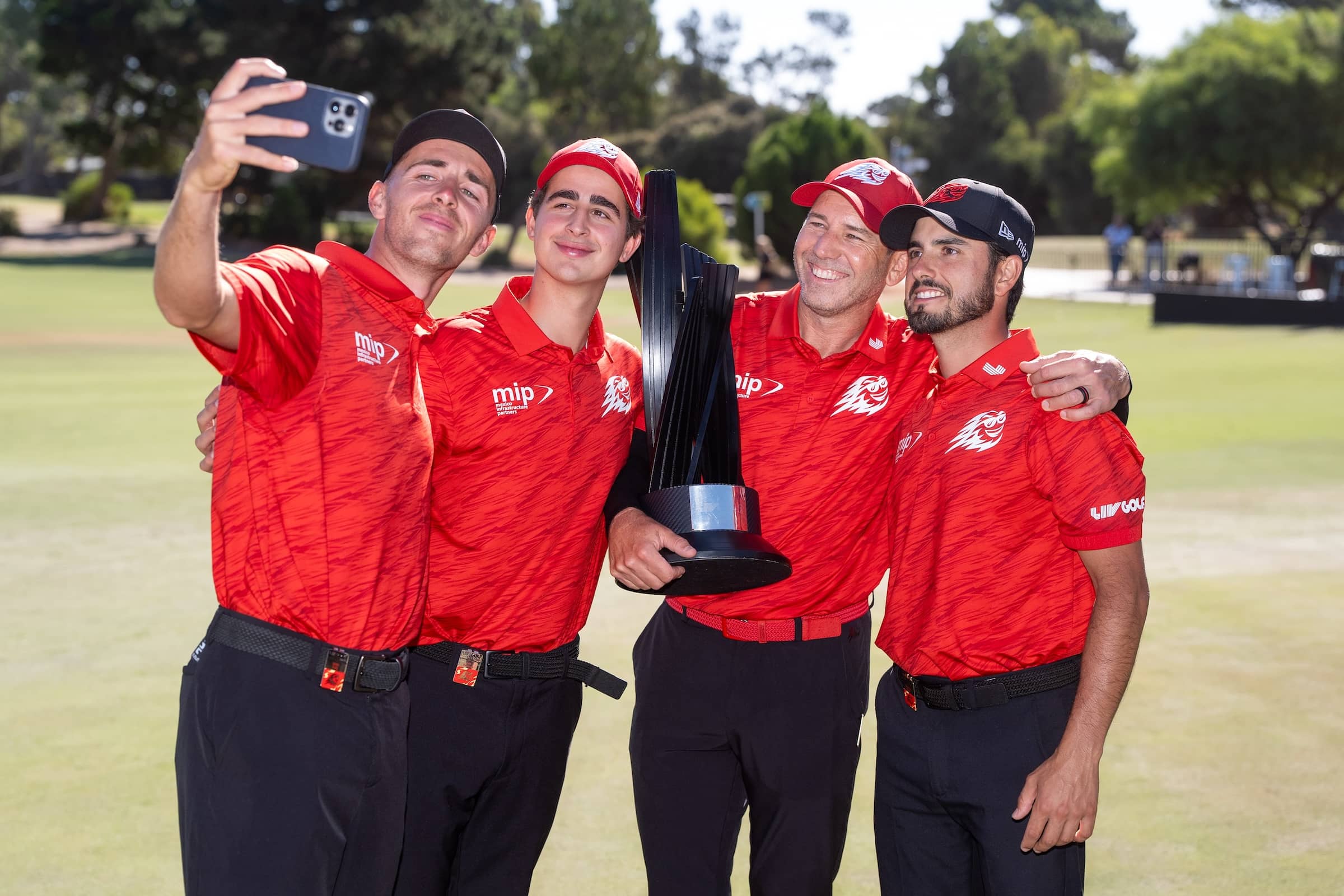 David Puig, Luis Masaveu, Sergio Garcia and Abraham Ancer of the Fireballs GC team pictured with the LIV Golf Adelaide team trophy after claiming victory on Sunday February 16