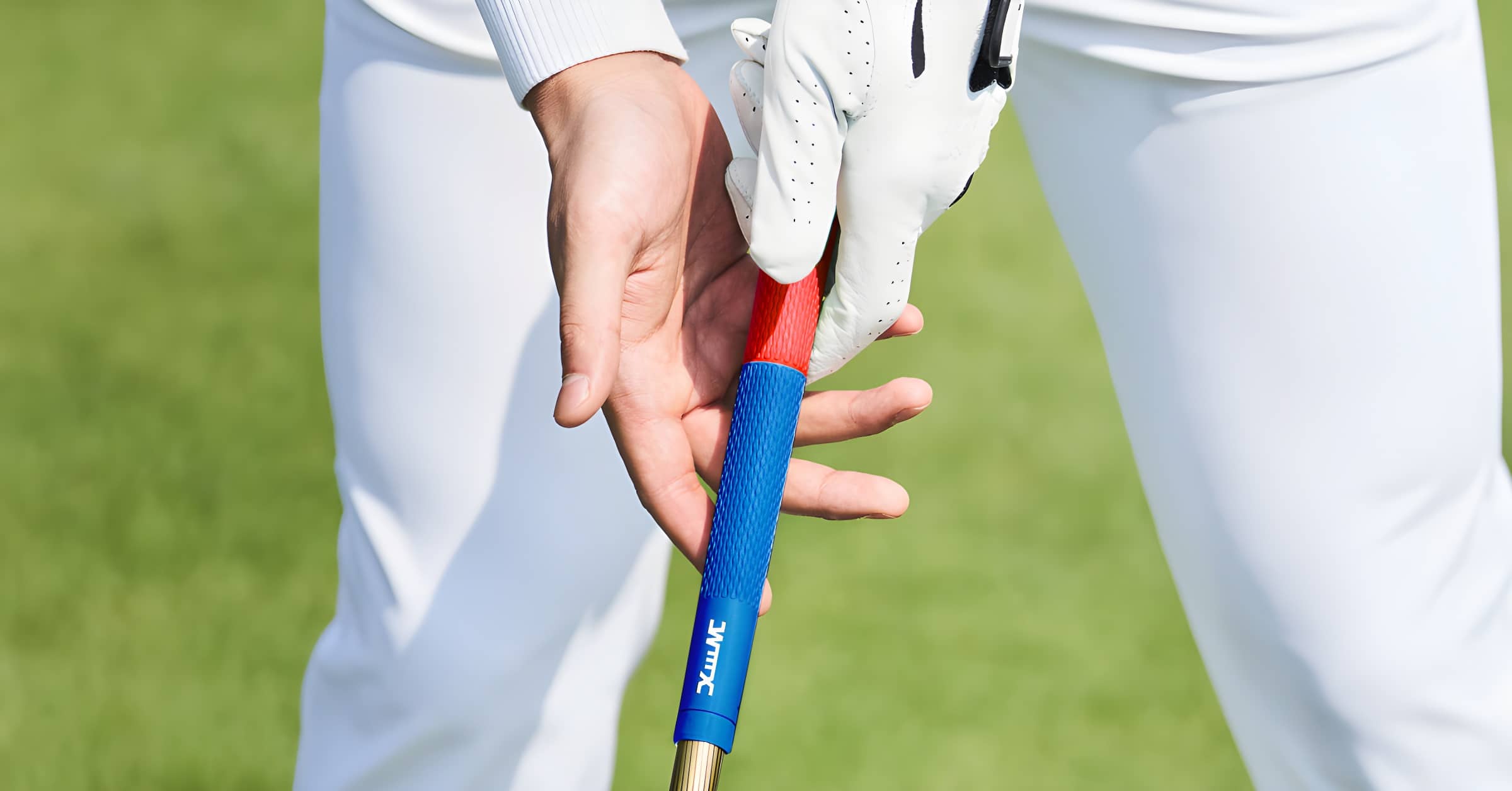 Golfer using WMX-player-red-blue Grip