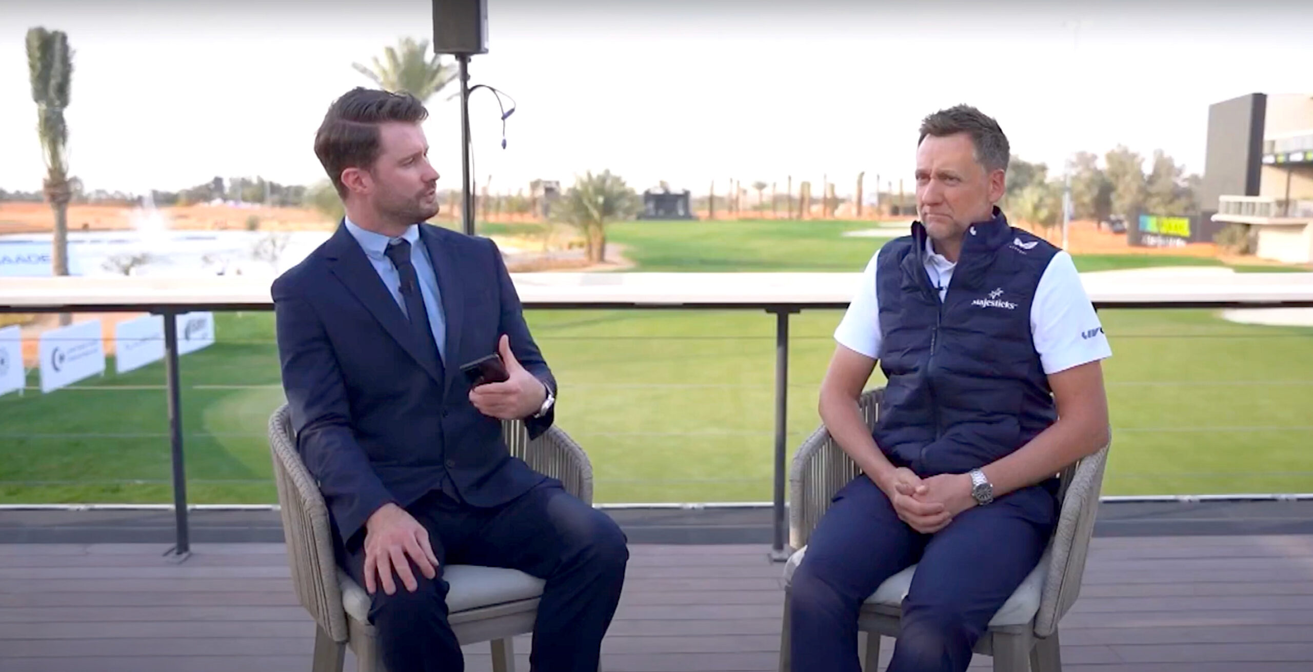 Ian Poulter talking with Michael Prendergast