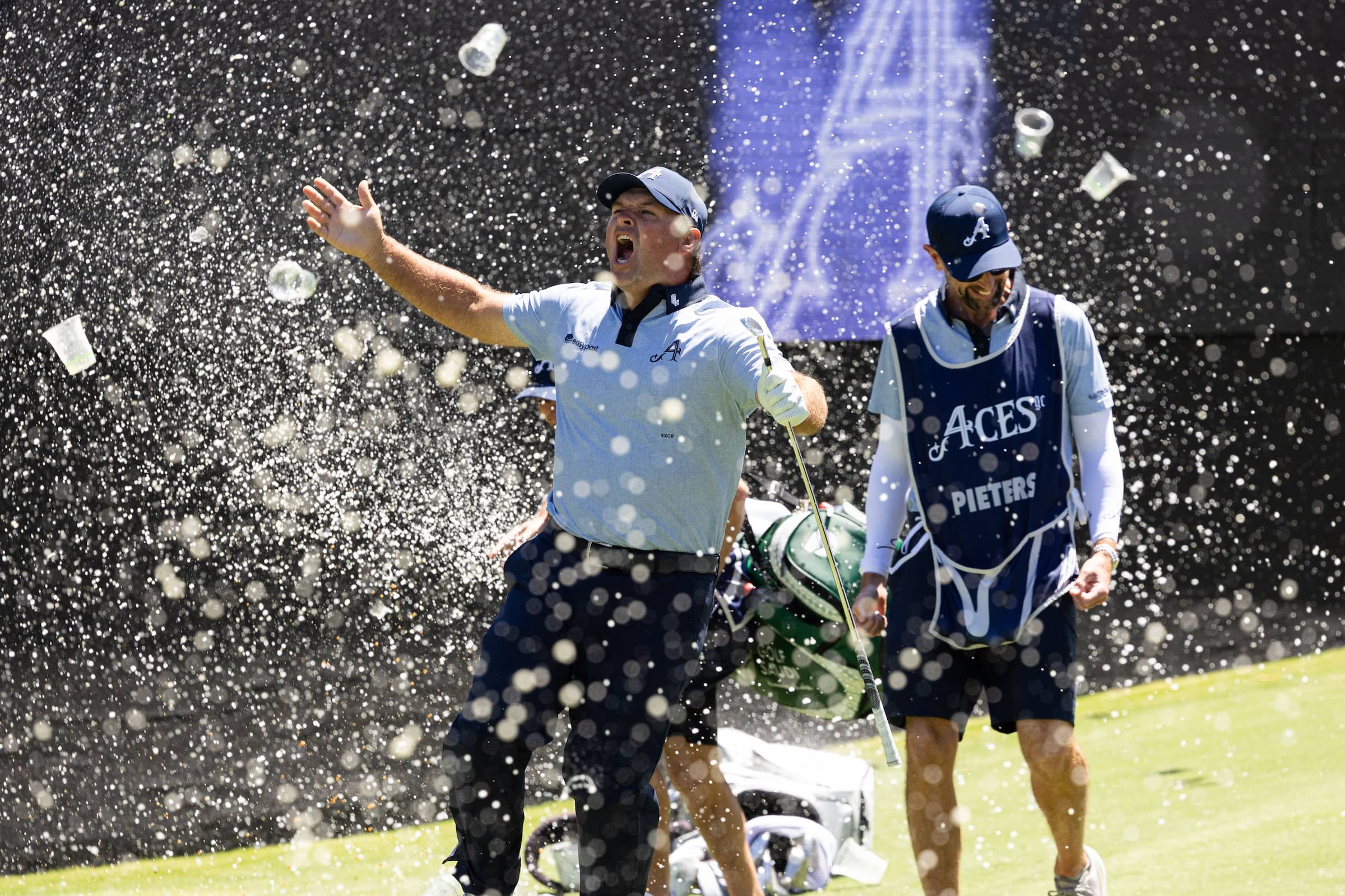 Patrick Reed of 4Aces GC reacts to his hole-in-one on the 12th hole during the first round of LIV Golf Adelaide at Grange Golf Club