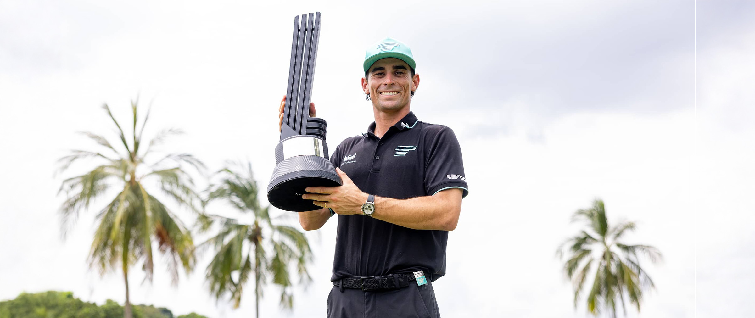 Individual Champion Captain Joaquín Niemann of Torque GC poses with the trophy after winning the final round of LIV Golf Singapore at Sentosa Golf Club