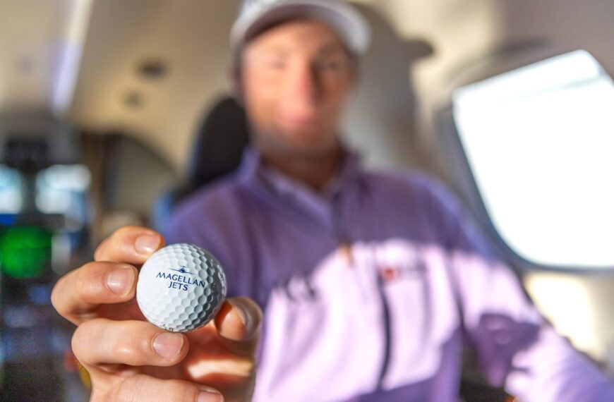 Magellan Jets Passenger holding Golf Ball