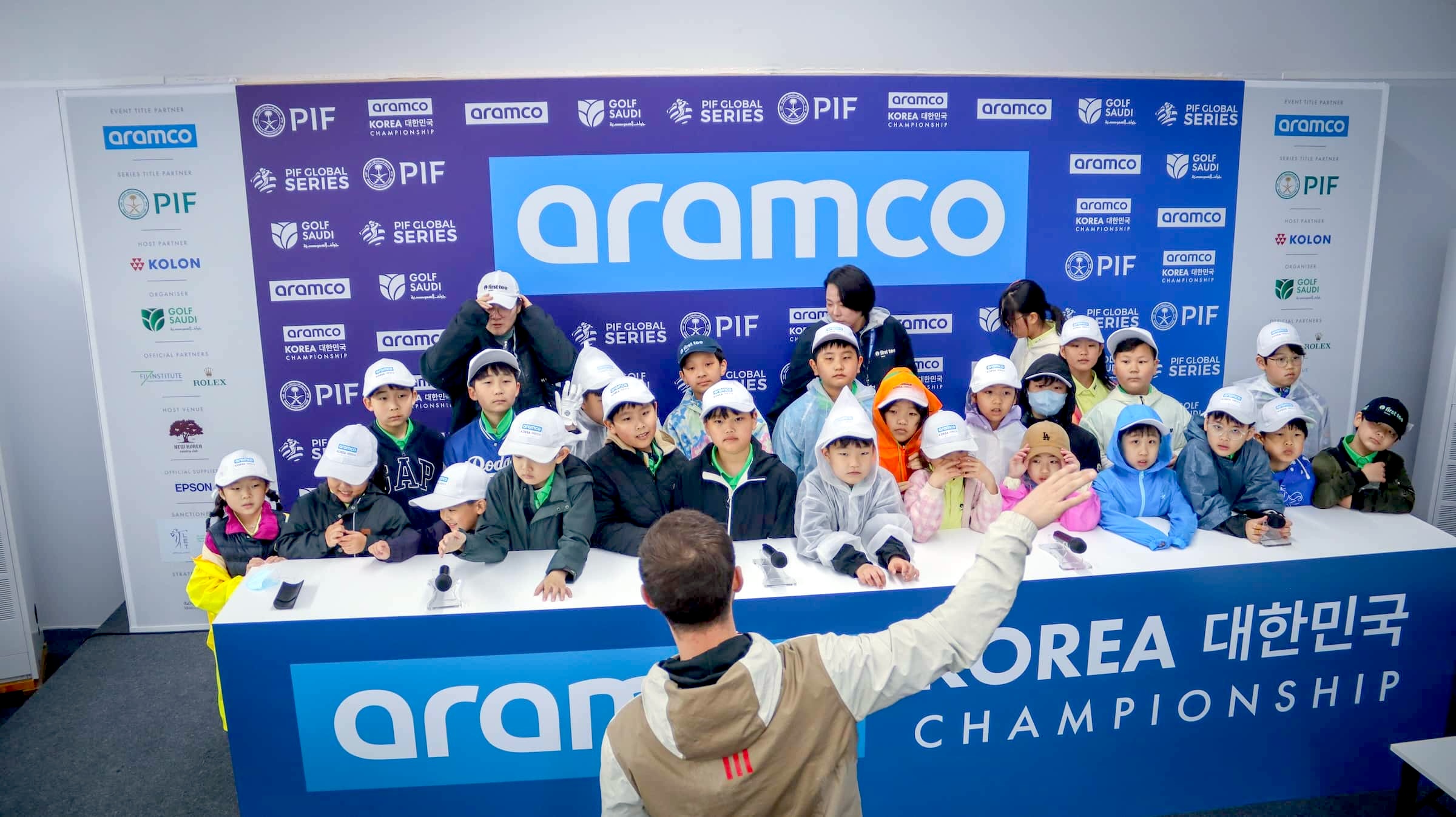 Children from the First Tee Korea initiative pictured in the media centre at the Aramco Korea Championship, the second of five events on the PIF Global Series in 2025.