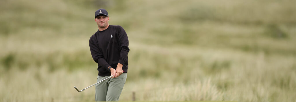 Dominic Clemons of England hits an approach shot during the Final on day six of The Amateur Championship at Ballyliffin Golf Club Donegal, Ireland