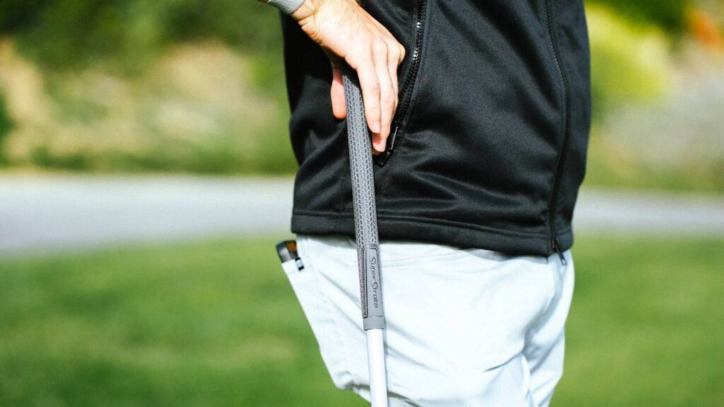Golfer leans on SuperStroke Gripped Club